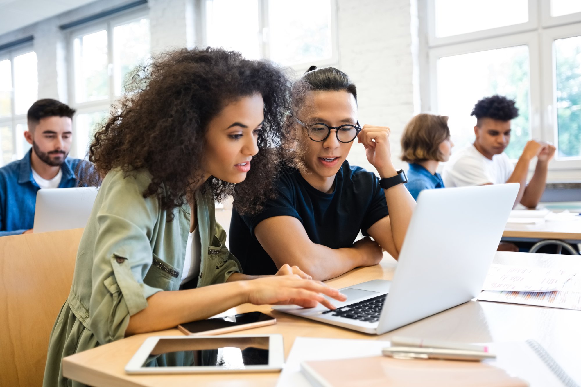 Students working together on a laptop